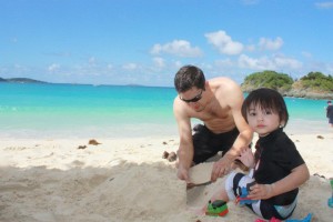 Building sand castle with dad.