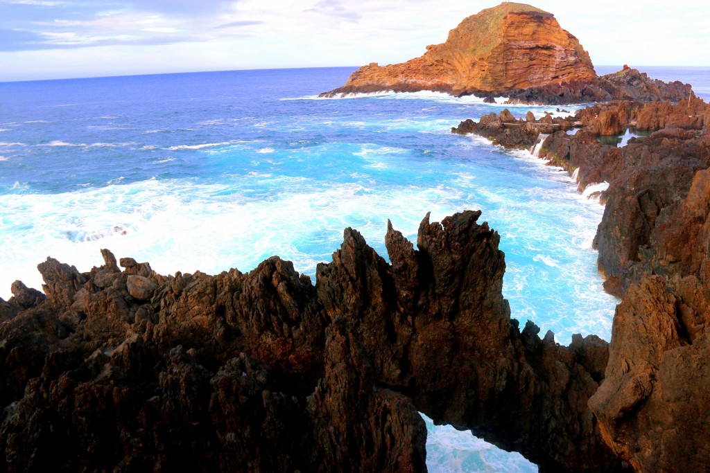 Lava rocks, deep blue crystal clear water and the waves makes this place not your ordinary chill location.