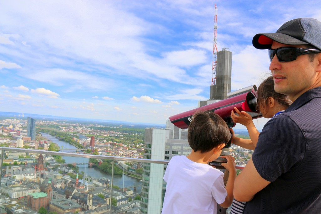 My husband showing the kids the view... Main Tower, Frankfurt Germany